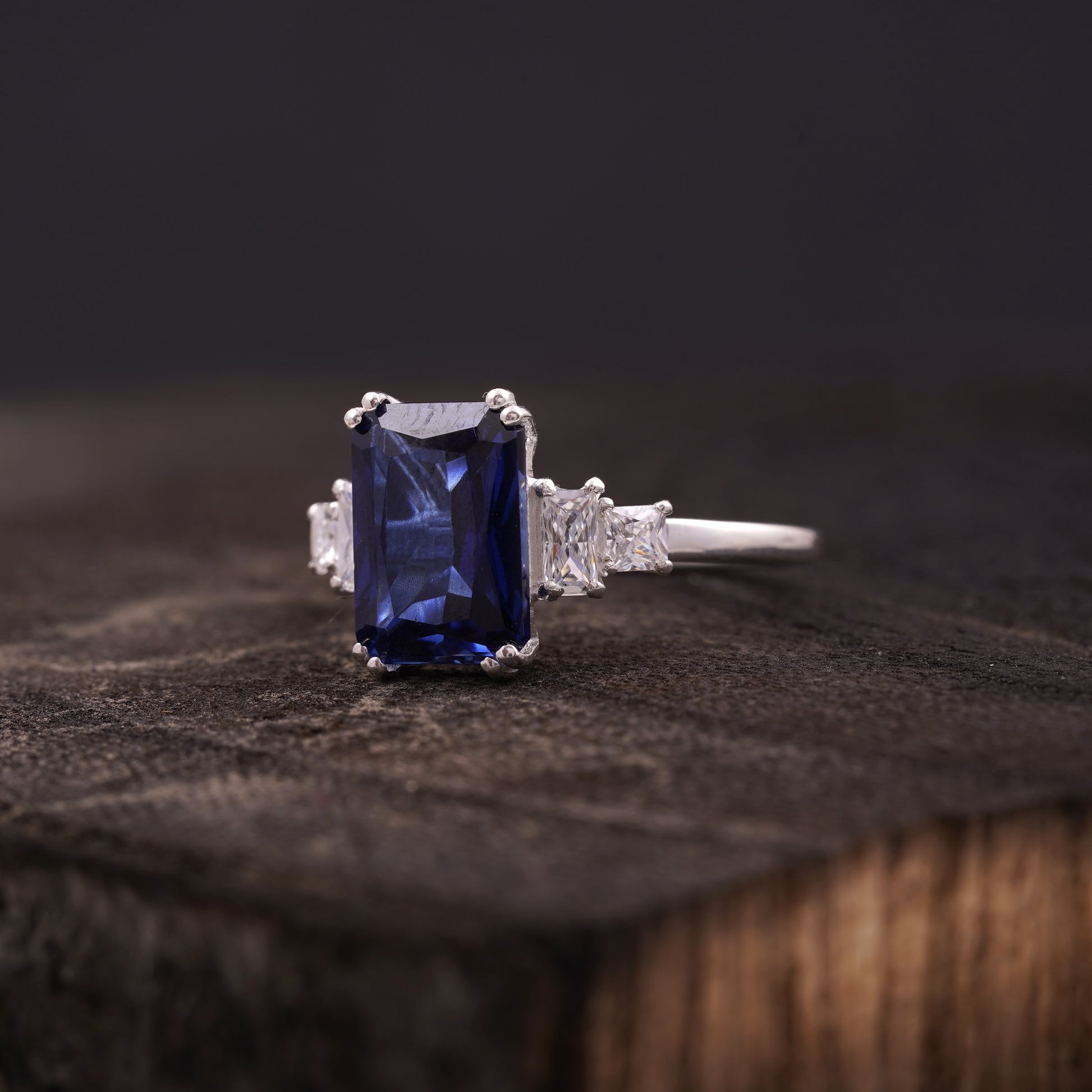 Emerald Blue Sapphire Silver Engagement Ring Left Angle