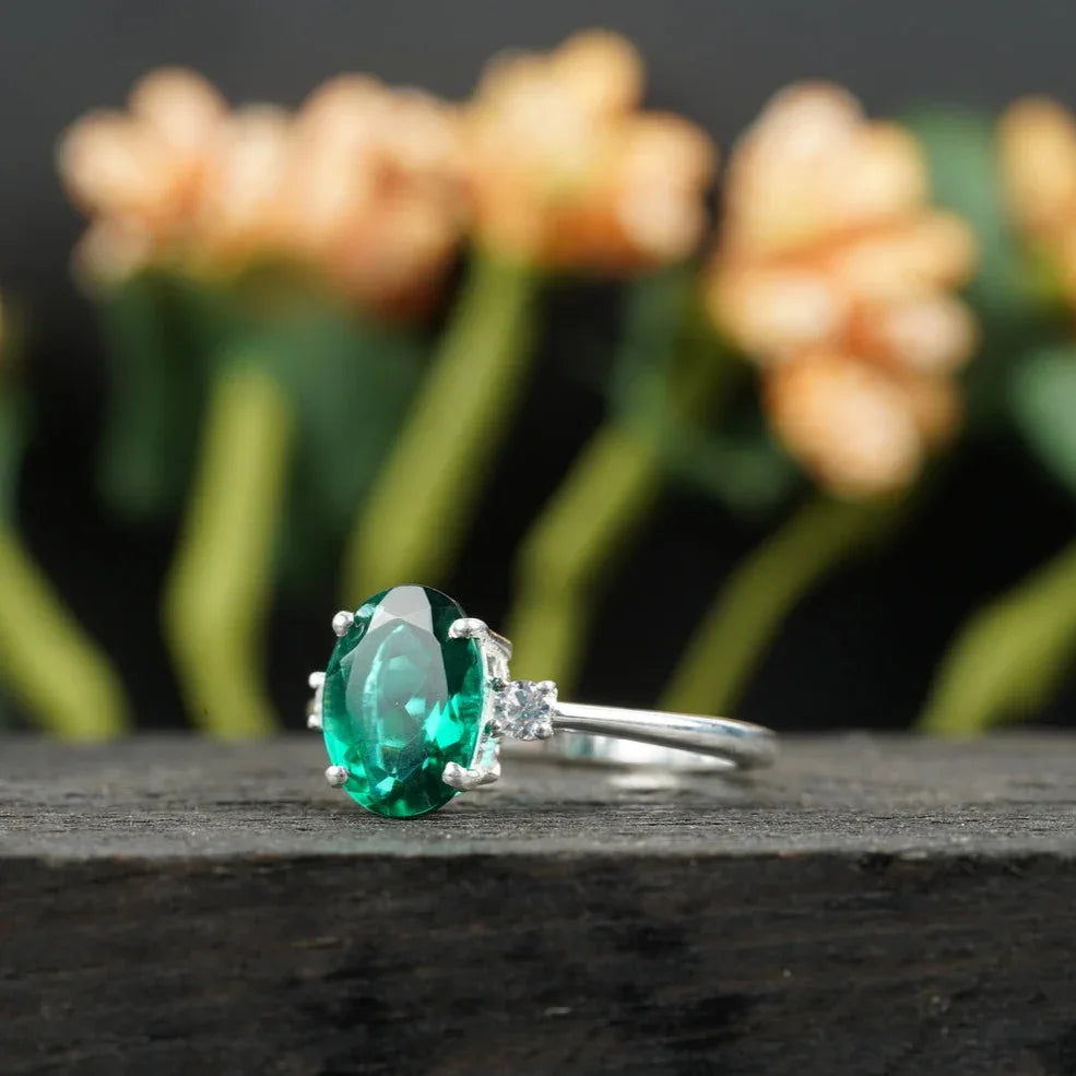 Oval Cut Emerald & Zirconia Three Stone Engagement Ring - MinimalistJewels