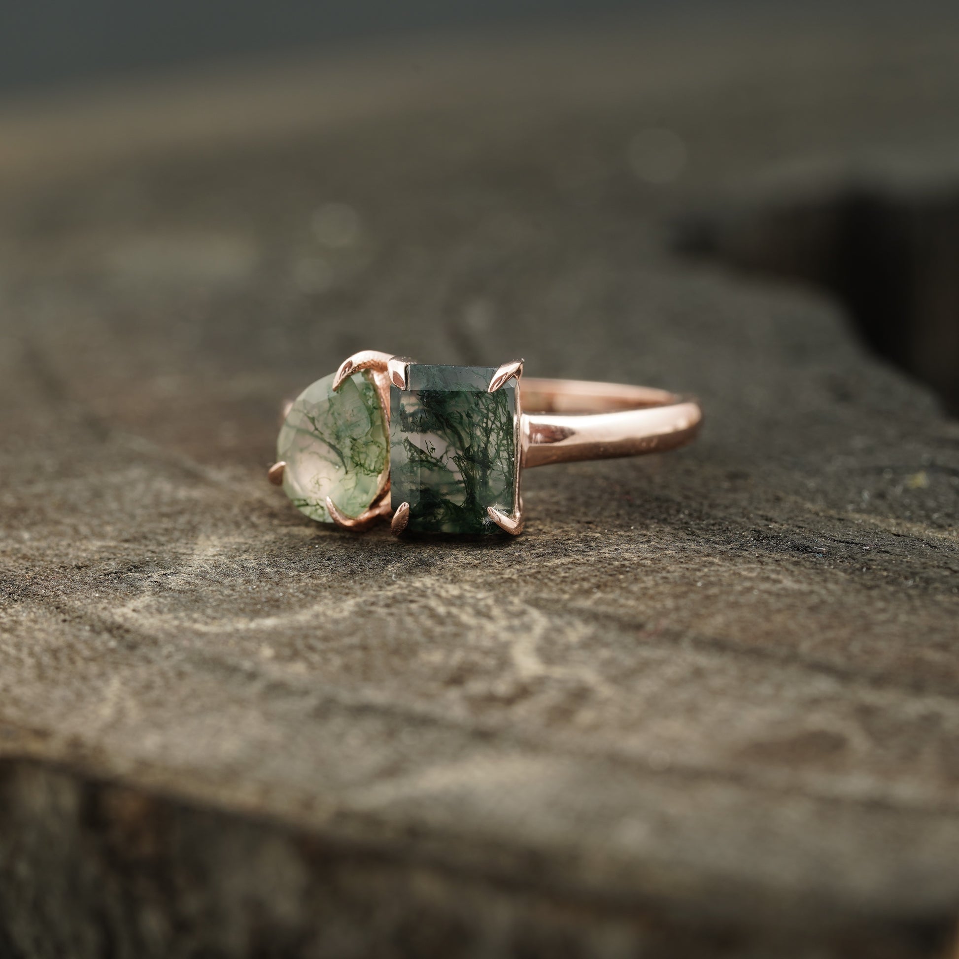 Moss agate and emerald engagement ring