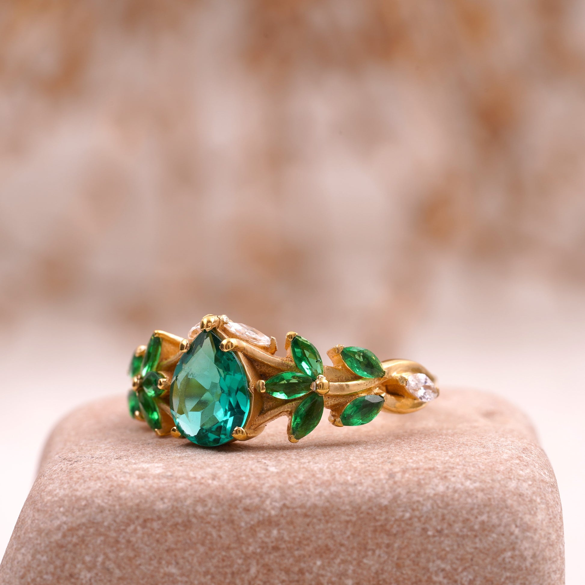 Pear Emerald Cluster Marquise Gold Engagement Ring Left Angle