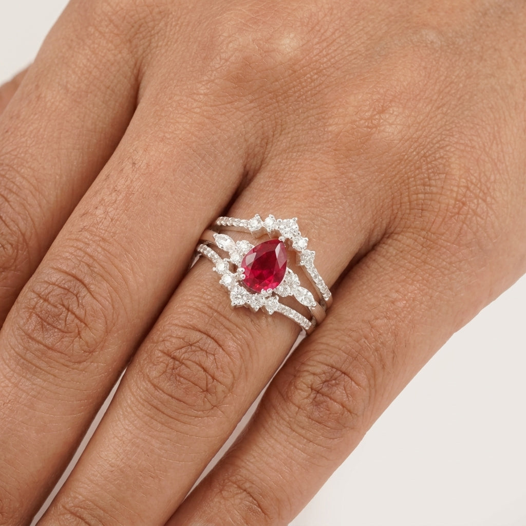 Pear Ruby Cluster Ring with Moissanite Enhancer wedding band With Model Finger