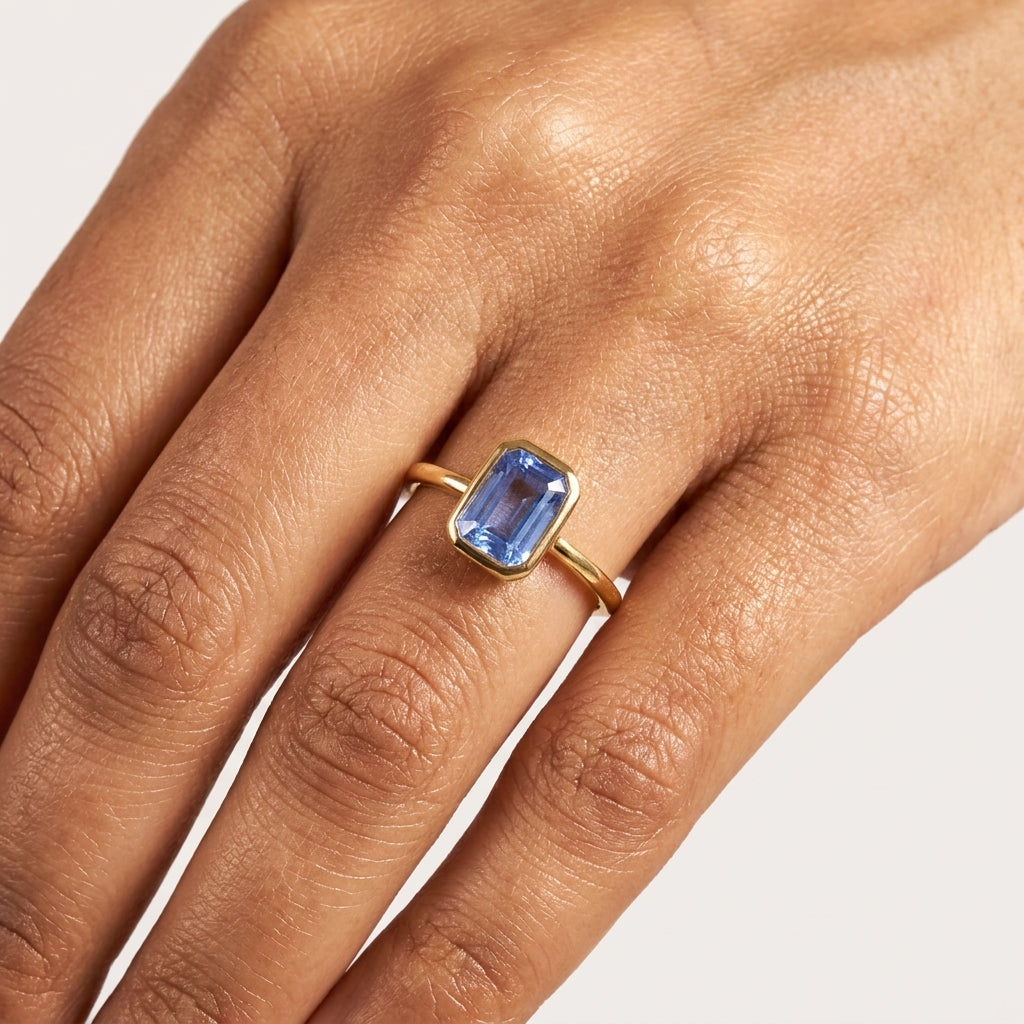 Aquamarine Gemstone Bezel Set Solid Gold Engagement Ring With Model Finger