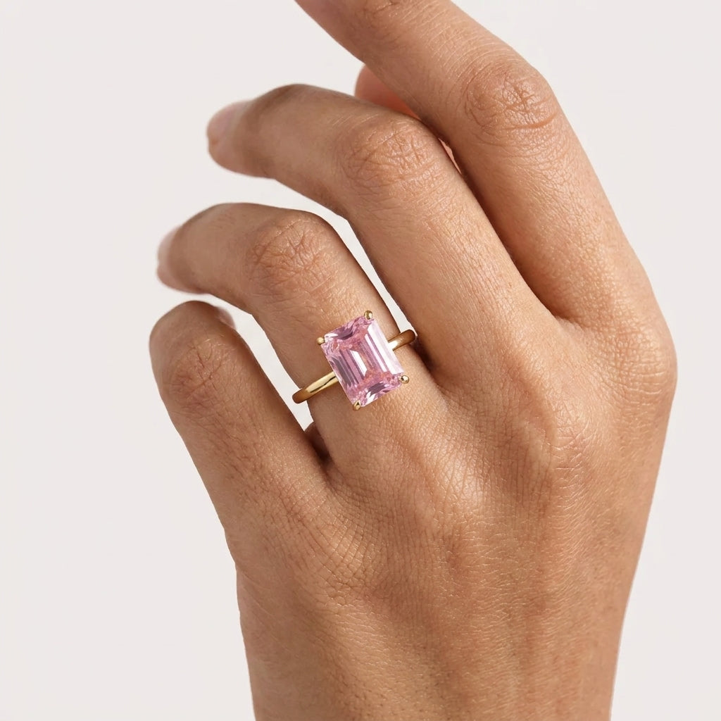 Emerald Pink Sapphire Gold Engagement Ring With Model Finger