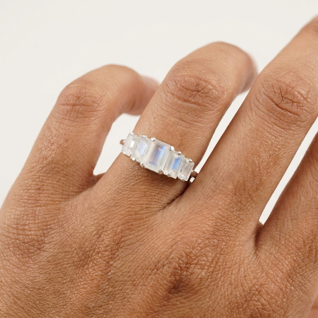 Emerald Cut Moonstone Engagement Ring With Model Finger