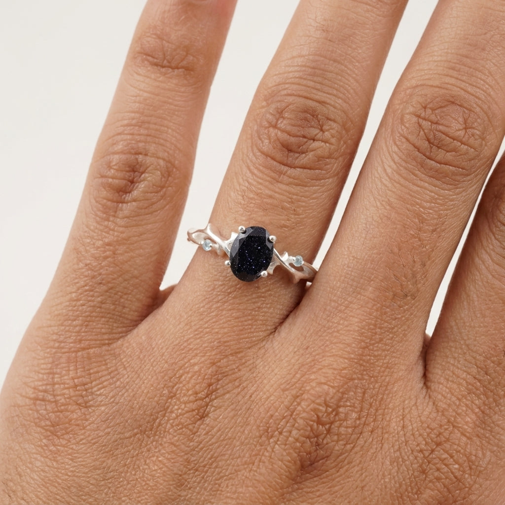 Oval Galaxy Sandstone Twig Engagement Ring With Model Finger