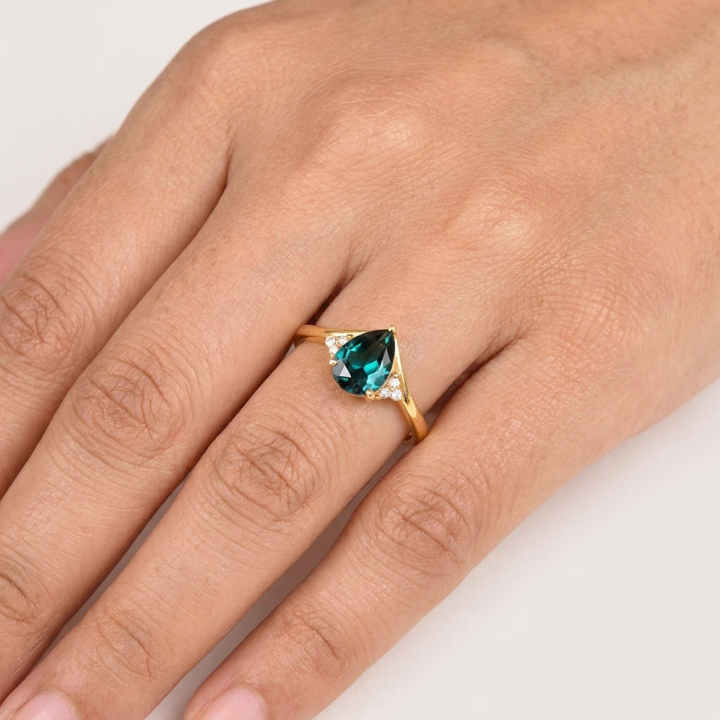 Green Emerald & Diamond Engagement Ring With Model Finger