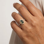 Oval Moss Agate Halo Diamond Engagement Ring With Model Finger