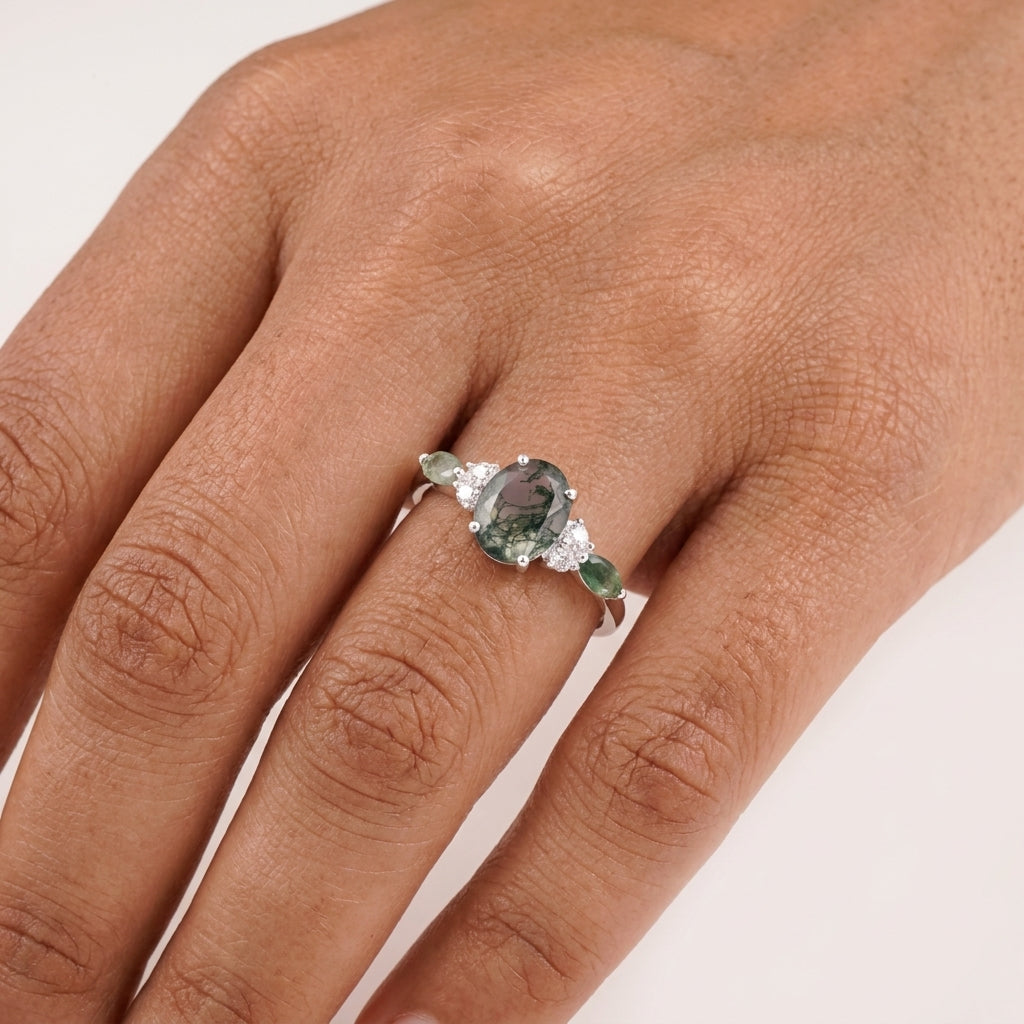 Moss Agate Oval Cut Silver Engagement Ring With Model Finger