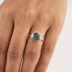 Hexagon Cut Moss Agate Bezel Set Engagement Ring With fingers