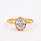Oval Cut Bezel Set Gold Engagement Ring