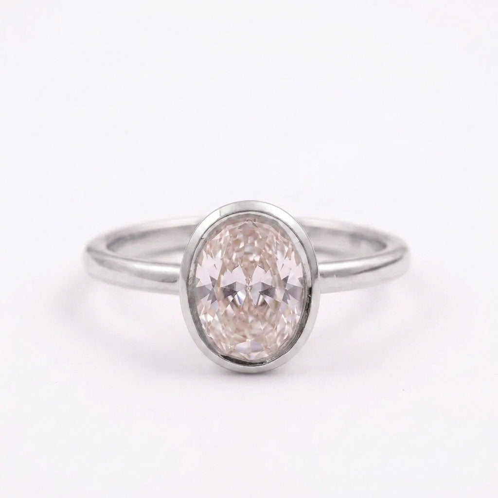 Oval Cut Bezel Set Silver Engagement Ring