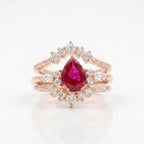 Pear Ruby Cluster Ring with Moissanite Enhancer Rose Gold wedding band