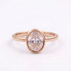 Oval Cut Bezel Set Rose Gold Engagement Ring