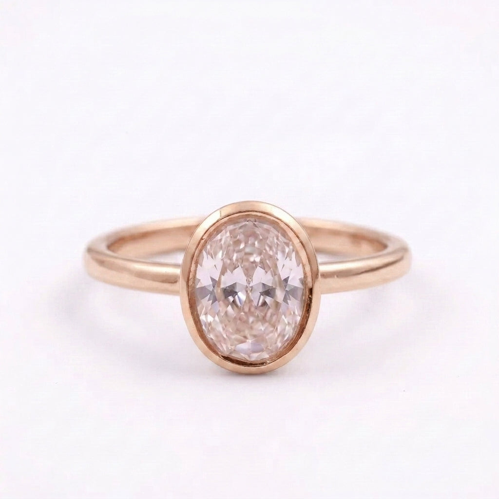 Oval Cut Bezel Set Rose Gold Engagement Ring